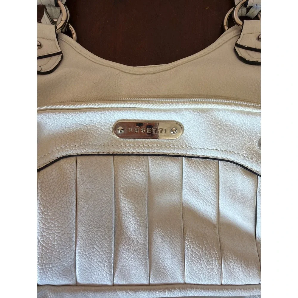 Rosetti Ivory Faux Leather Shoulder Bag Braided Strap Multi Pocket Hobo Purse